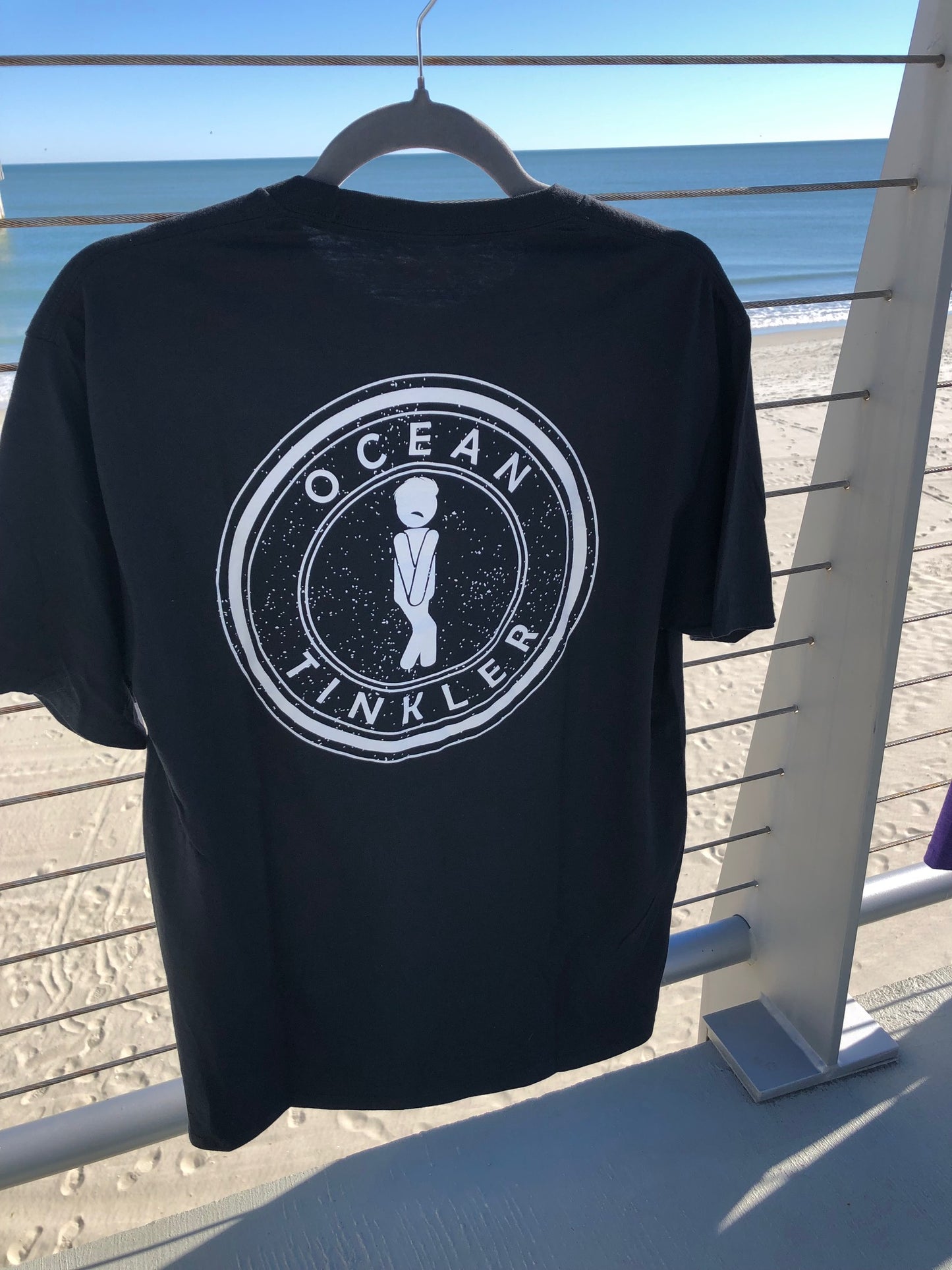 ocean tinkler t shirt at the beach