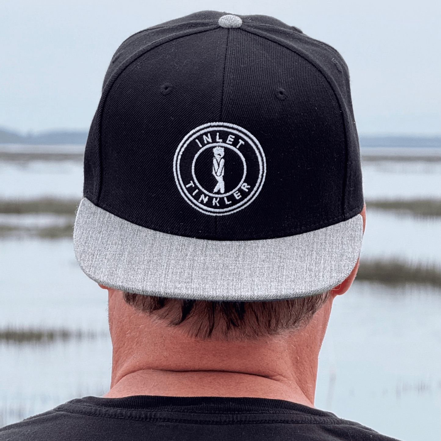 Inlet Tinkler Hat – Flat Bill Snapback | Black & Grey Embroidered Cap