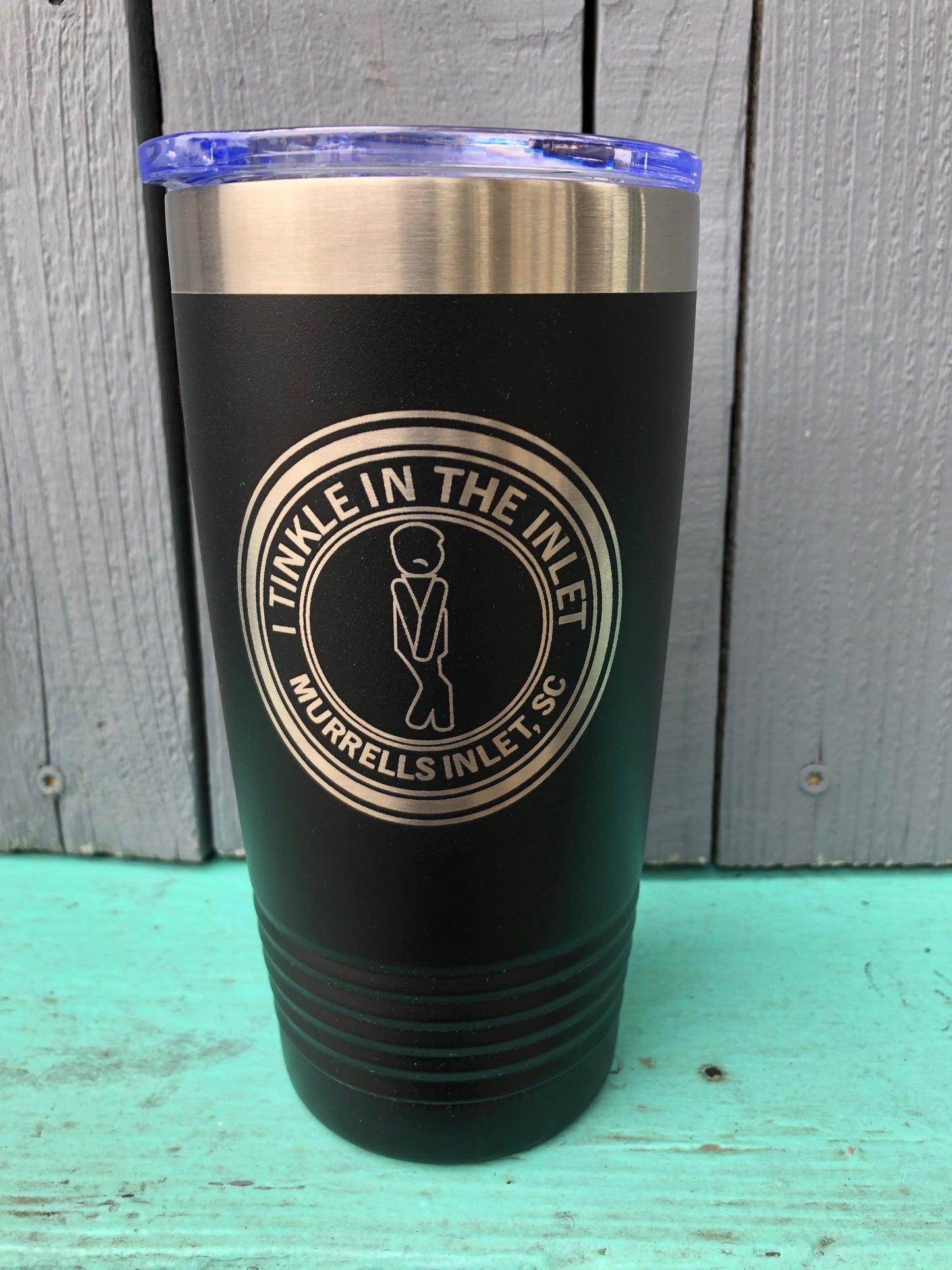 Black stainless steel 20 oz tumbler with "I Tinkle In The Inlet – Murrells Inlet, SC" engraved logo and clear lid photo at Marshwalk