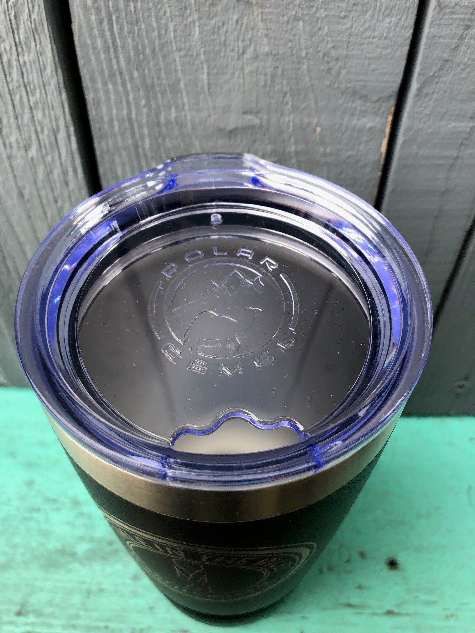 top of Black stainless steel 20 oz tumbler with "I Tinkle In The Inlet – Murrells Inlet, SC" engraved logo and clear lid