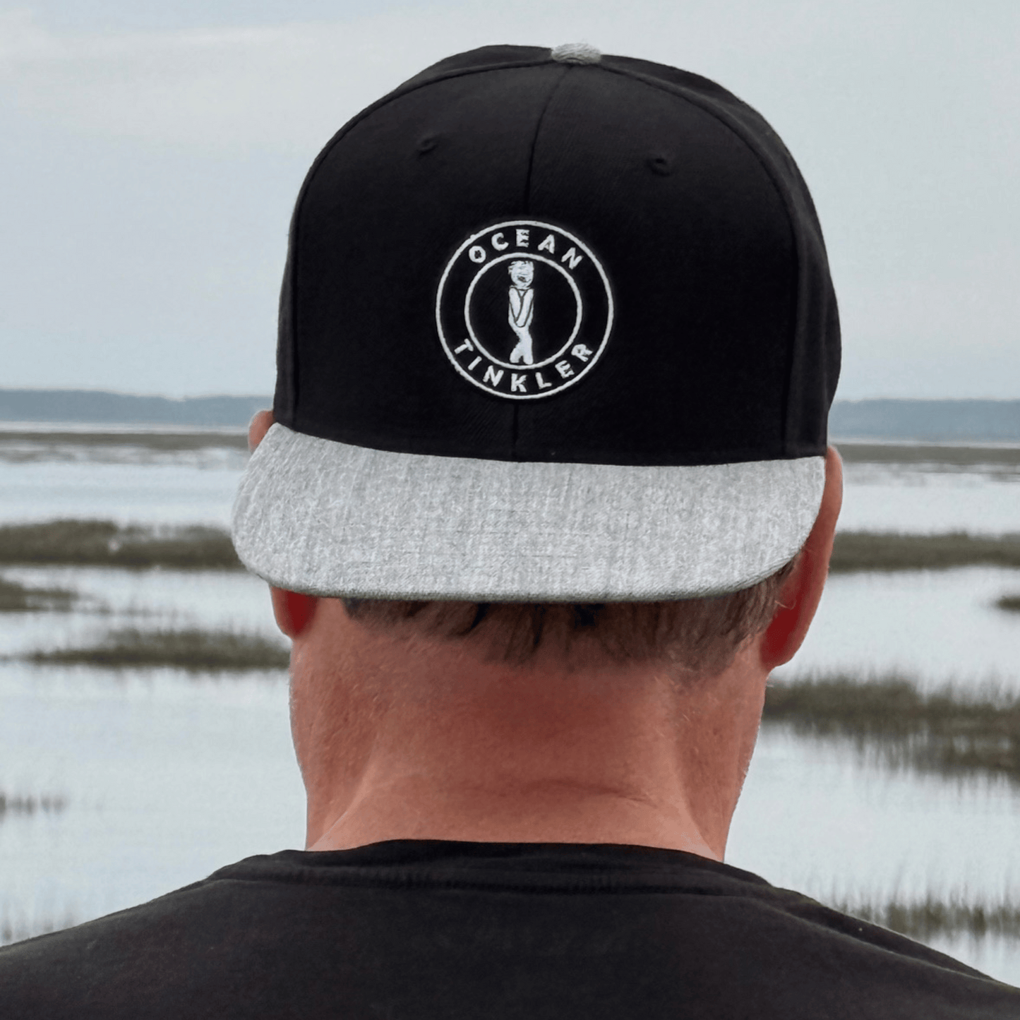 Ocean Tinkler Hat – Flat Bill Snapback | Black & Grey Embroidered Cap